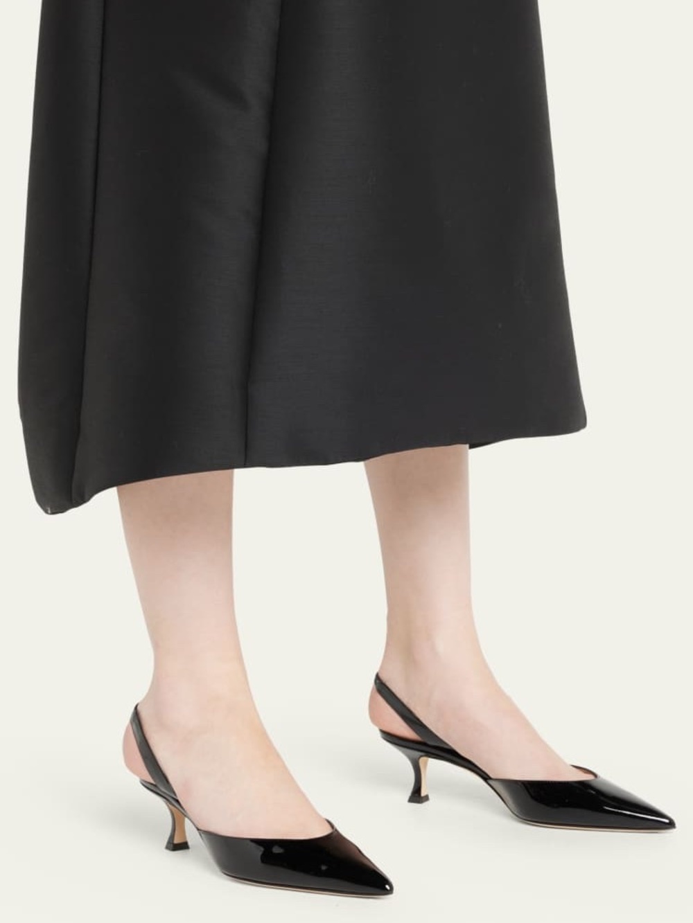 Manolo Blahnik “Carolyne” Black Patent Slingback Kitten Heel Pumps